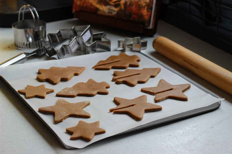 gingerbread biscuits on lined baking tray