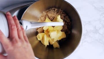 combining butter and sugar in the food mixer