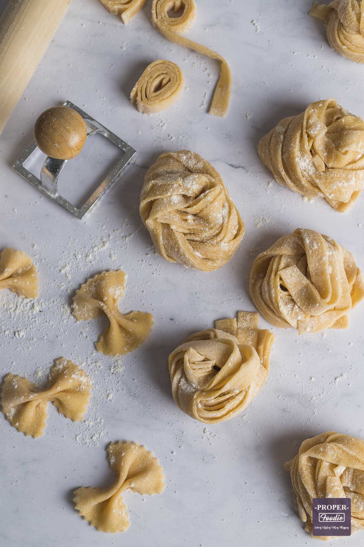 Making pappardelle pasta, cutting pasta dough into strips