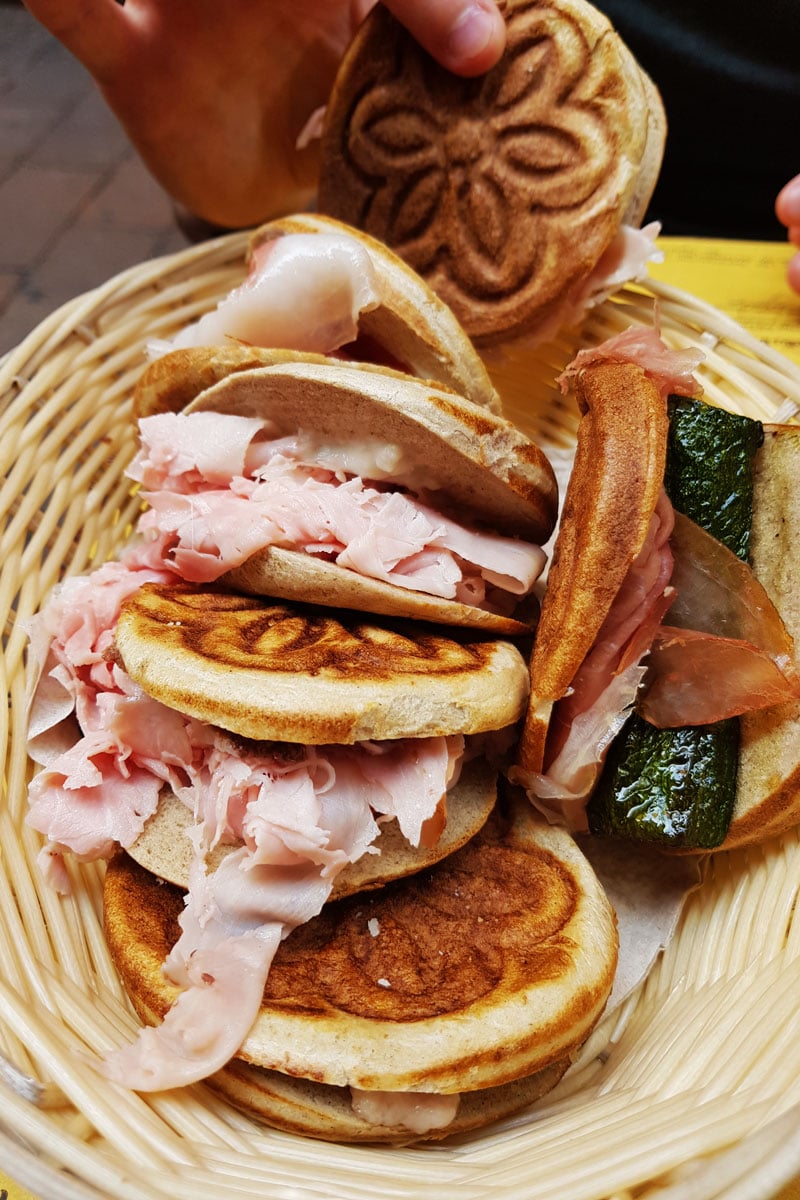 https://properfoodie.com/wp-content/uploads/2018/02/ham-and-cheese-tigella-in-bologna.jpg