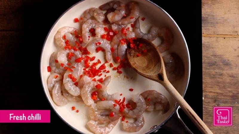 stir fry prawns with a little oil and freshly chopped red chilli