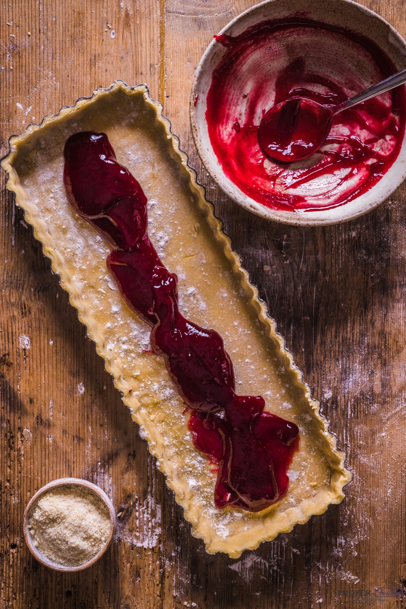 Layer of jam added to the pastry