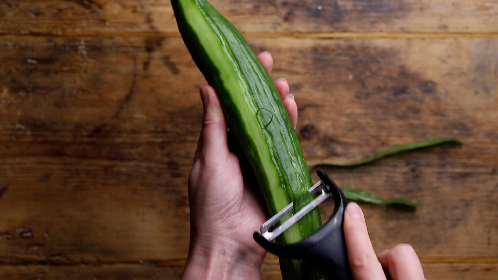 roughly peel the cucumber